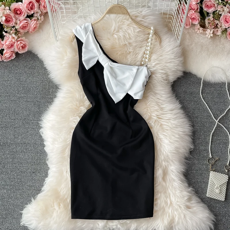 

Summer new bow one shoulder Dress Tube top temperament sexy commuter slim fit woman dress Was thin and high waist design sense