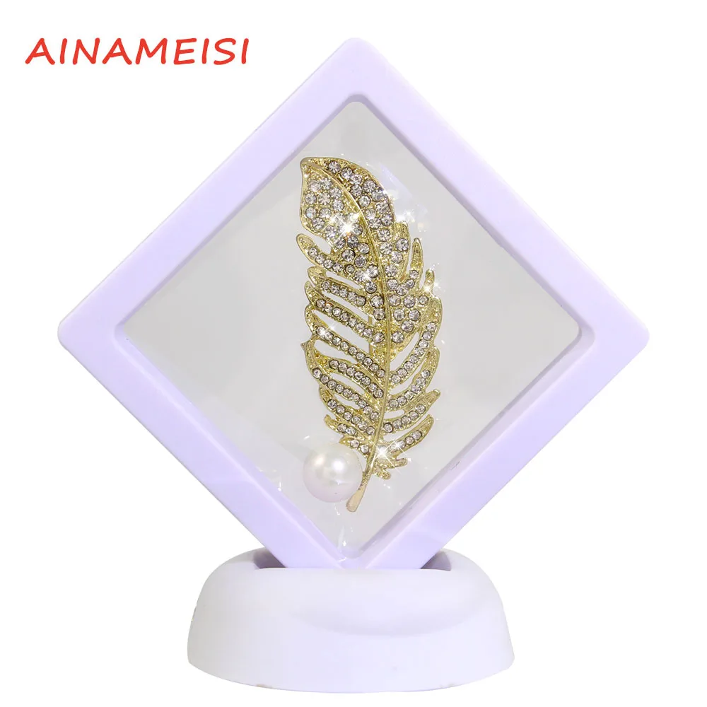 

AINAMEISI Boxed New Fashion Ladies Simple And Exquisite Pearl Big Feather Dress Shirt Brooch Pin Clothing Decoration