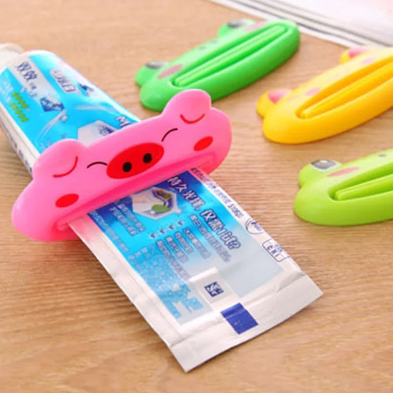 

2Pcs Cartoon Tube Roll Holder Dispenser Toothpaste Squeezer Press Tube Dentifrice Dispenser Kitchen Bathroom Accessories
