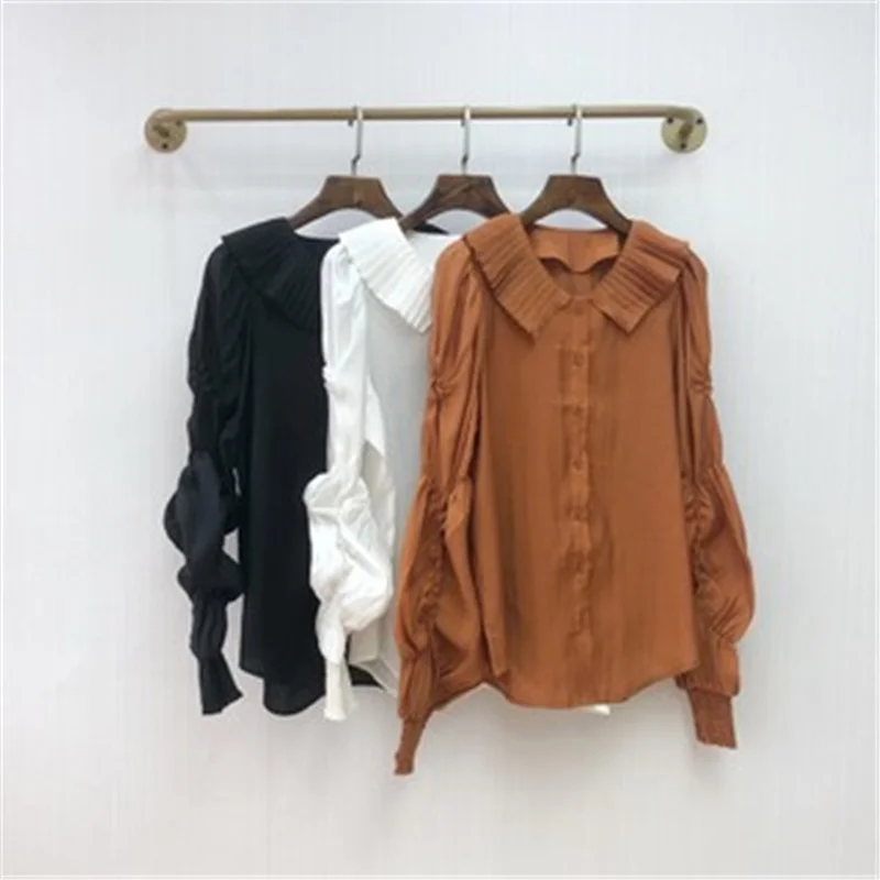 

Women's wear spring 2021 new niche designer pleated leader son lotus festival structure loose covering meat slimming shirt