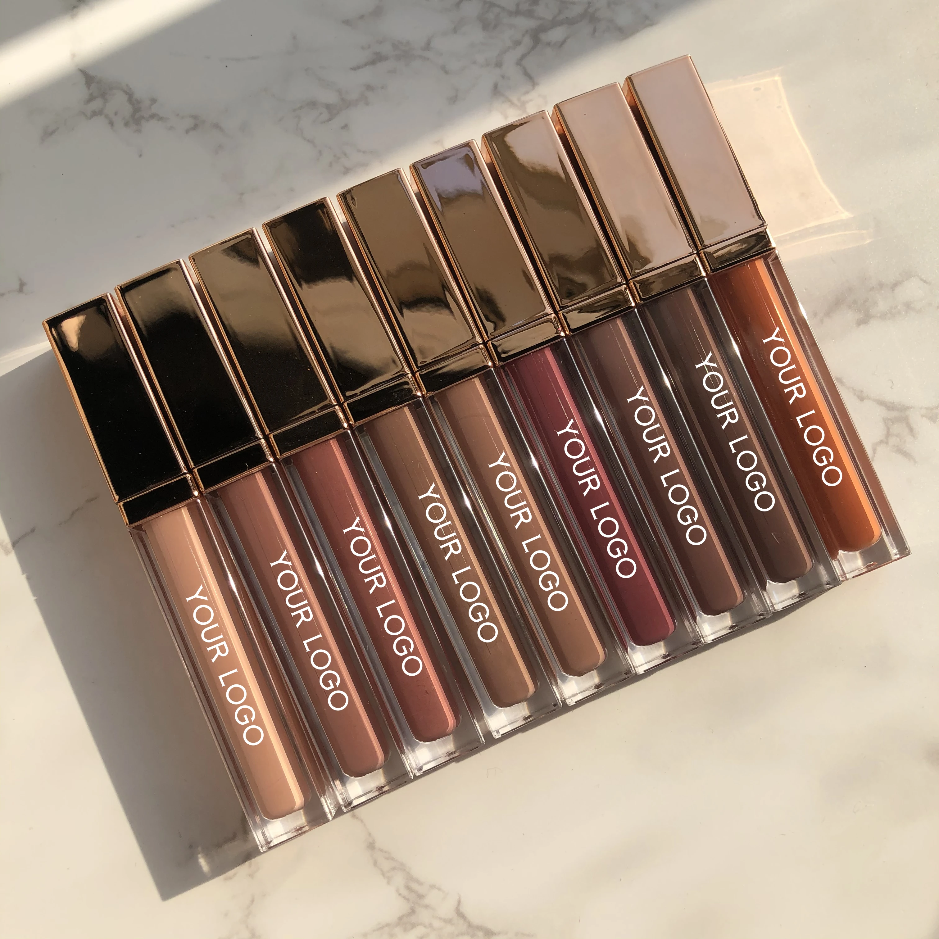 

Nude Brown Shades Moisturizing Lip Gloss Wholesale Custom Logo Bulk Cosmetics Lip Glaze Private Label Plumping Shiny Shimmer