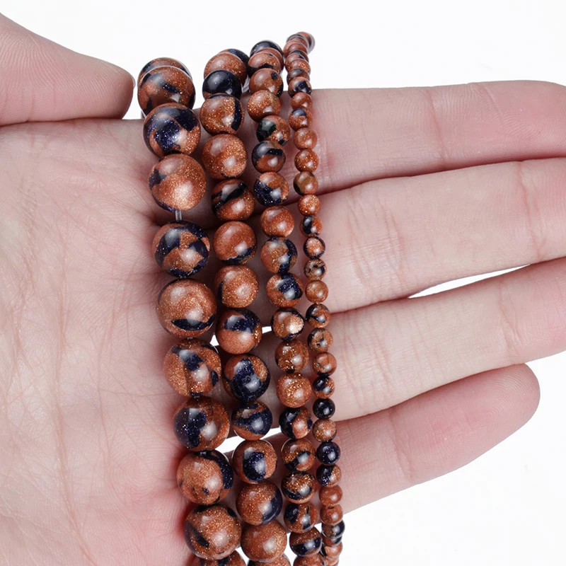 Бусины из натурального камня красные темно-синие мелкого песка для