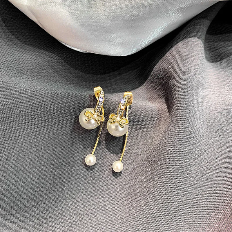 Женские двойные серьги гвоздики USTAR корейские жемчужные золотого цвета с бантом