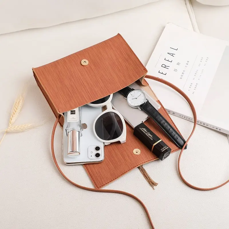 

2021 Fashion Women Ladies Solid Simple Small PU Leather Crossbody Handbags Tassel Decor Casual Cellphone Shoulder Bags Purse