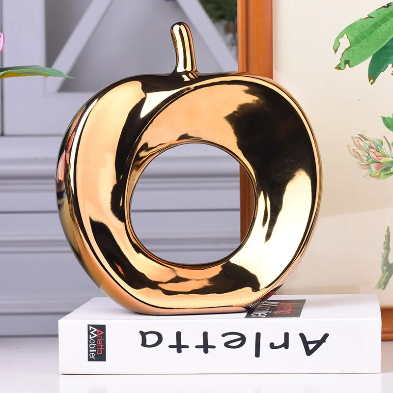 В абстрактном керамическая с гальваническим покрытием яблоко рукоделия