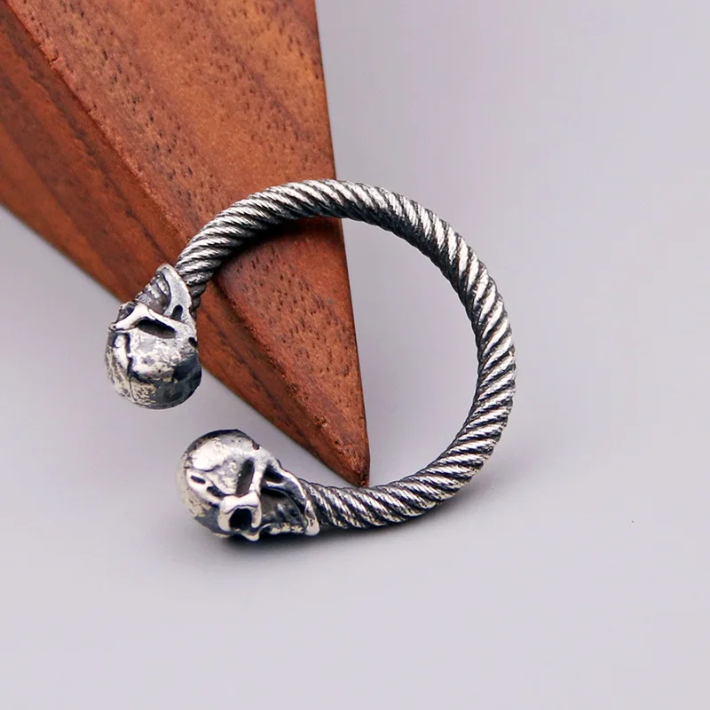 Мужское и женское кольцо с двойным черепом регулируемое черного цвета из 100%