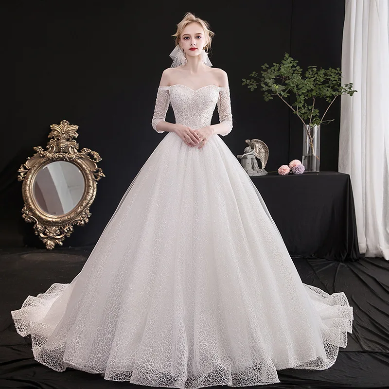 

New Princess Wedding Dress Long Sleeve 2023 Luxury Lace Beads Off Shoulder Boat Neck Ball Gown Bride Gowns Royal Train Plus Size
