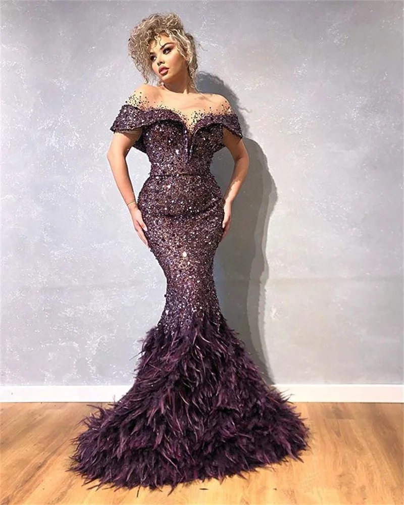 

Glitter Mermaid Evening Dresses Sheer Jewel Neck Sequins Feather Prom Dress Capped Short Sleeves Sweep Train Formal Party Gown