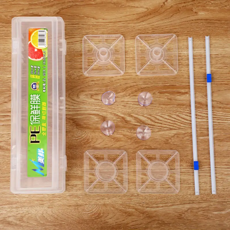 

Cutter Adjustable Cling Film Plastic Food Wrap Dispenser with Slide Cutter Preservation Foil Storage Box with Suction Bottom