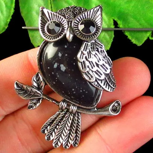 

Snowflake Obsidian Wrapped Tibetan Owl Pendant Bead