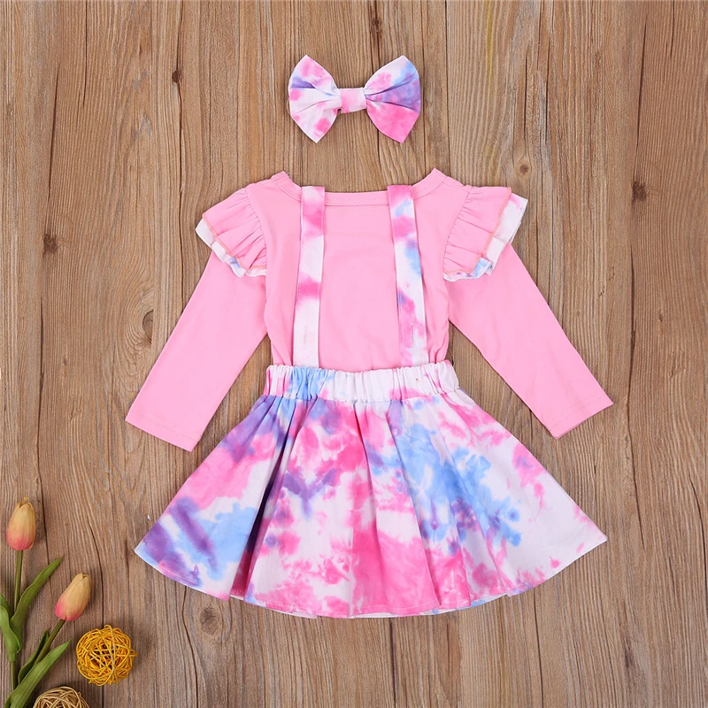

BY Baby Girl's Two Piece Suit Long Sleeve Ruffled Shoulder Top Tie-dyed Suspender Skirt Bowknot Hairband Baby Girl Clothing Set