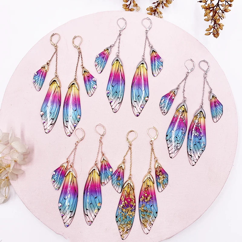 

Origin Summer Fairy Resin Butterfly Earrings for Women Shining Crystal Flake Double Wing Long Drop Earrings Ladies Jewelry 2020