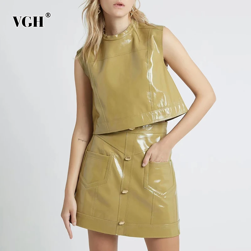

VGH Casual Solid PU Leather Two Piece Set For Women O Neck Sleeveless Tops High Waist Mini Skirts Korean Slim Sets Female Summer