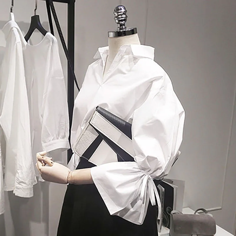 

2021 Spring Summer Korean Version Of Wild Loose V-Neck Short Front And Back Long White Shirt Lantern Trumpet Sleeve Lace Shirt