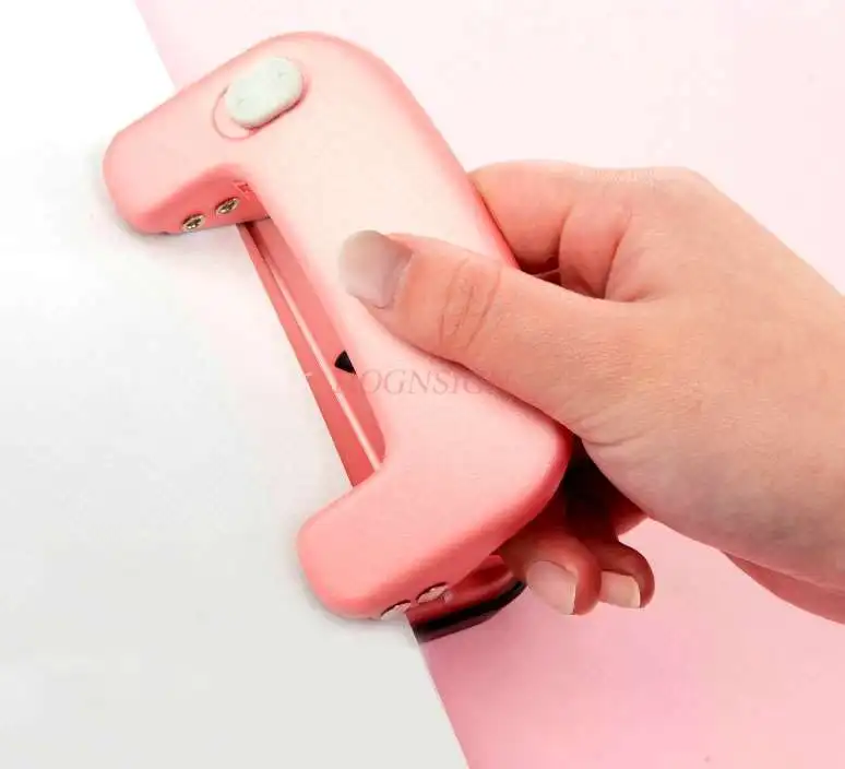 Double hole punch small punch machine loose leaf A4 paper round hole punch office documents student binding punch