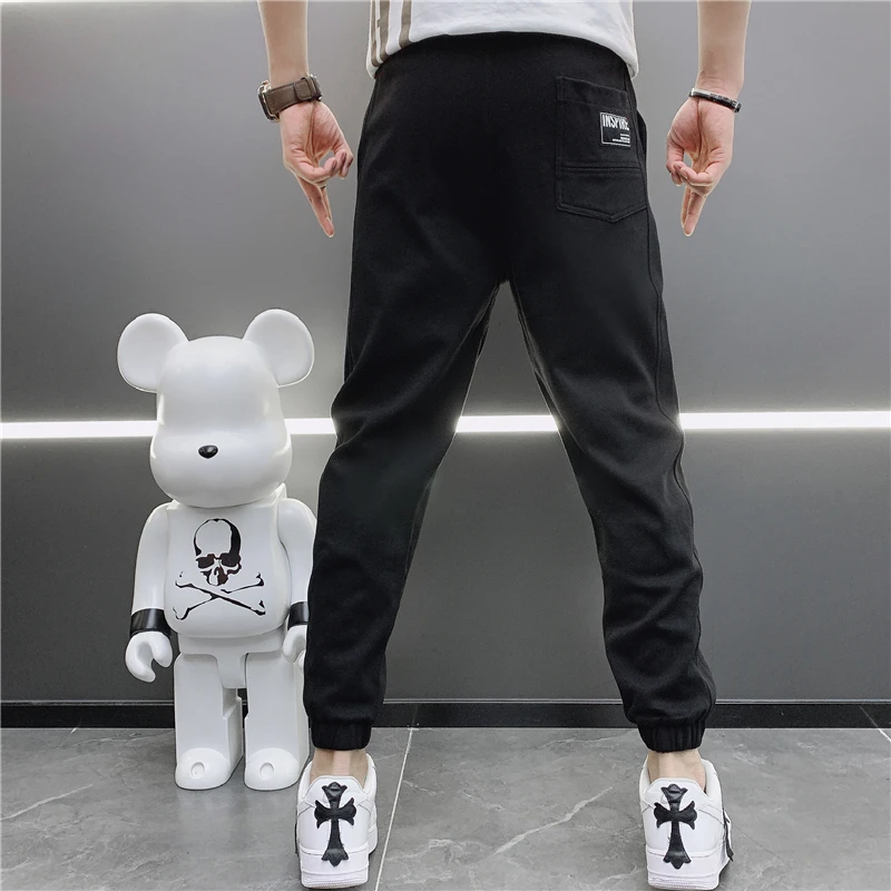 

Men's casual pants 2021 spring/summer new popular logo letter print trend slim fit tie foot sports pants men