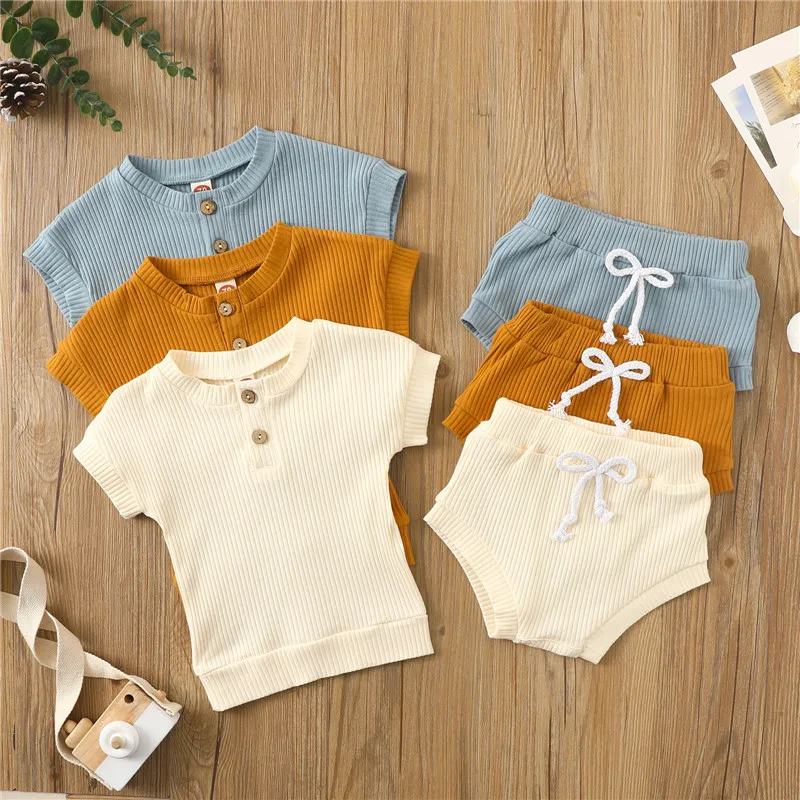 

Детские летние однотонные комплекты одежды, хлопковые футболки с коротким рукавом и пуговицами в рубчик для новорожденных мальчиков и дево...