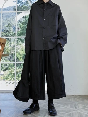 Новая Осенняя коллекция-это небольшая черная рубашка на пуговицах по