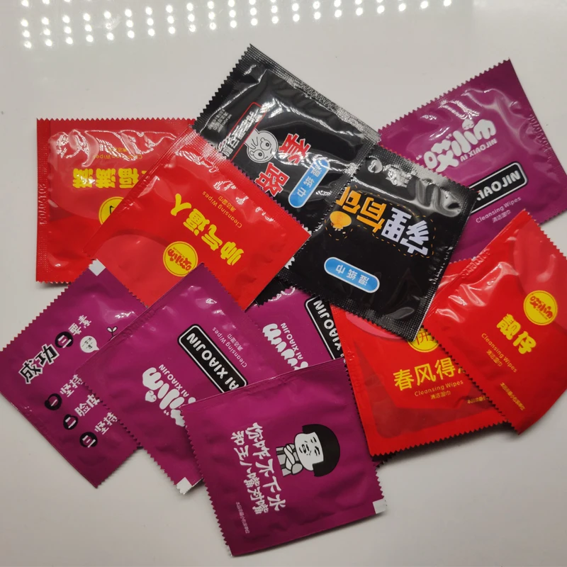 

Cartoon Condom Shape Wet Wipes Tissue Individually Wrapped Aloe Essence Portable