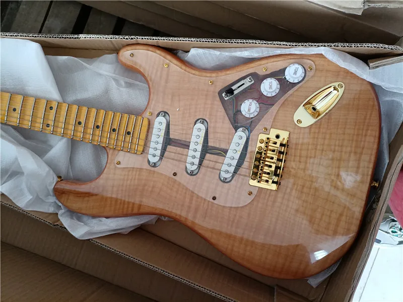 

mahogany body scalloped fingerboard,big headstock Maple fingerboard ST electric guitar Natural maple tiger Paste the top 67