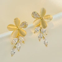 xiyanike opal rhinestone petal flowers earrings gold plant 2020 new trendy stud earrings temperament fairy jewelry female