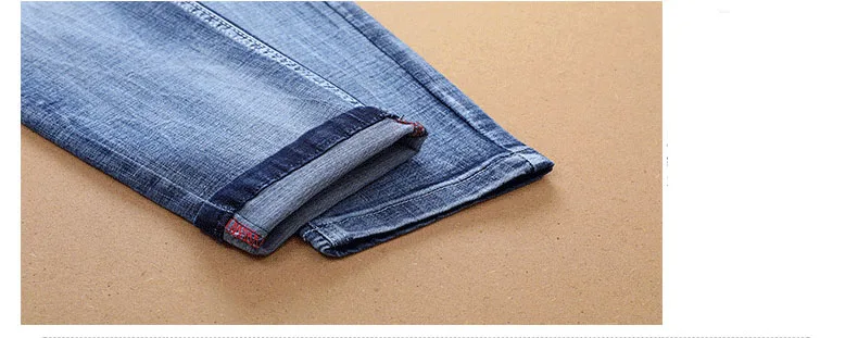 

European American Style fashion brand men blue jeans luxury Men's denim trousers Slim Straight skull pattern jeans for men