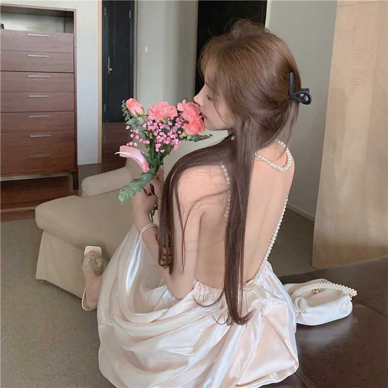 

Пикантная нишевая уличная одежда в гонконгском стиле с бантом, популярная женская темпераментная кофта с открытой спиной, женское летнее п...