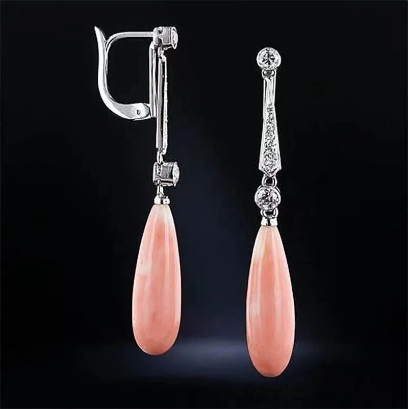 

WISH cross-border selling bohemian art coral and diamond earrings European and American ladies engagement earrings.