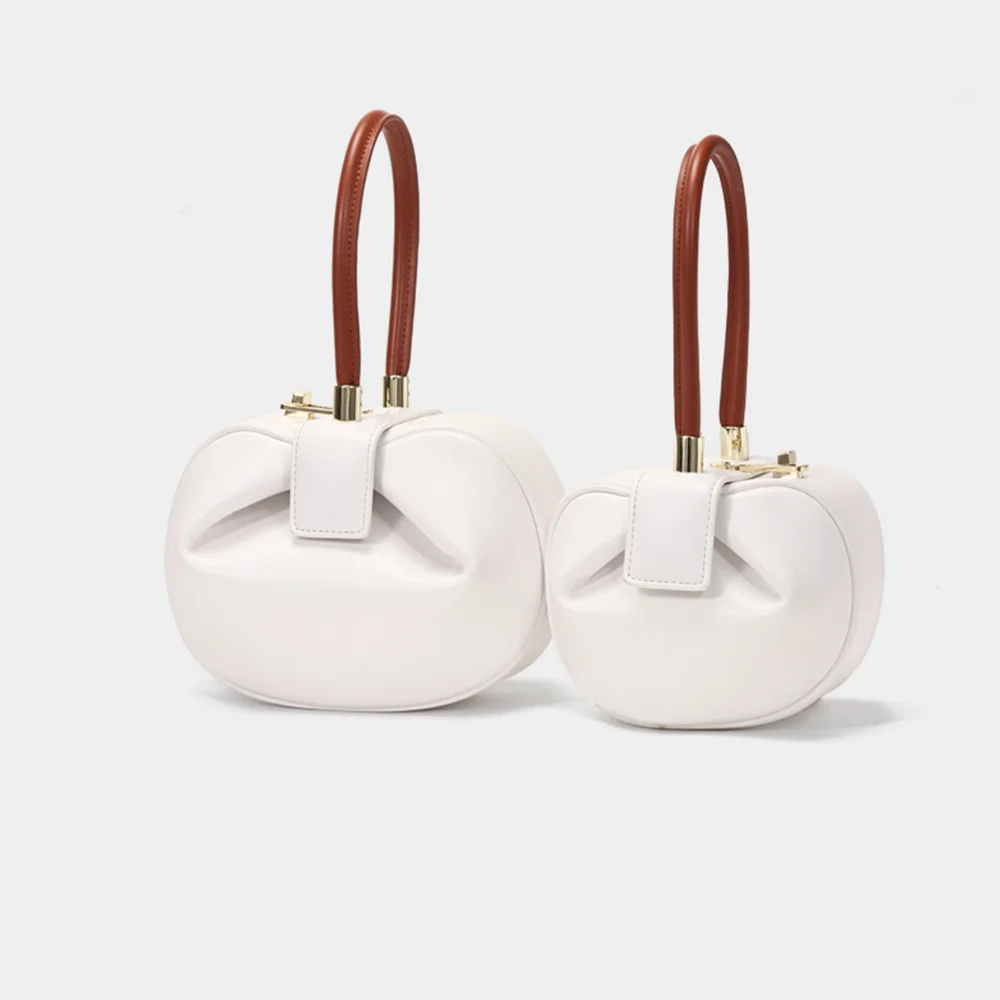 

2021 New Women's Fashion Retro Cowhide Leather Simple Solid Color Portable Hand Carry Cute Girl Dumpling Underarm Bag Green PM18