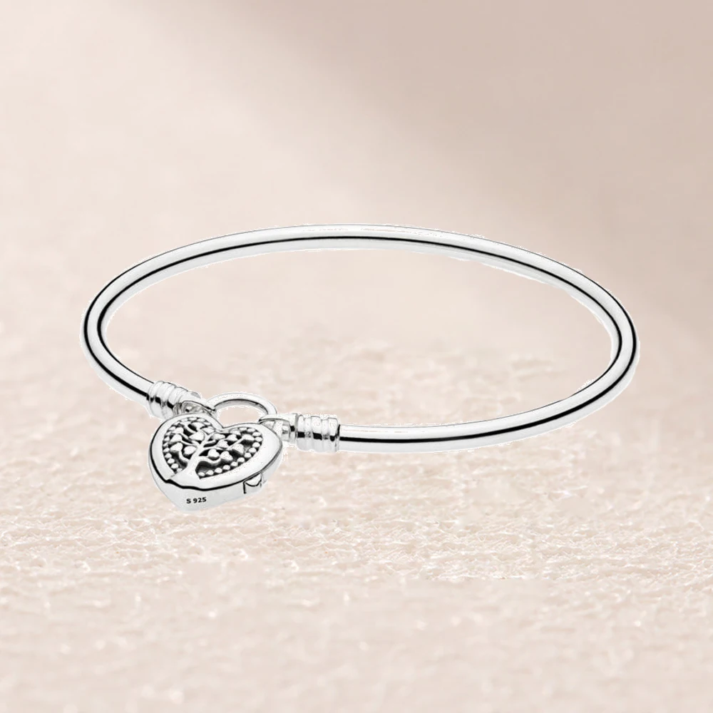 

597101 MOMENTS STERLING SILVER BANGLE WITH TREE OF LOVE CLASP