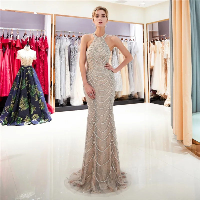 

Luxurious Celebrity Dresses Sexy Halter Neck Backless Heavy handmade Beaded Crystals Evening Party Gowns Mermaid Long Dubai