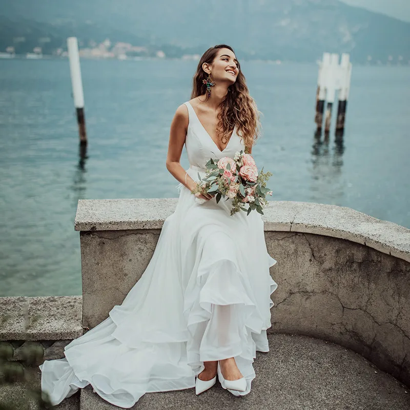 

Sexy Satin Light Wedding Dresses Sleeveless V-Neck Simple Bride Dress Floor-Length Train Wedding Gown Customized Made