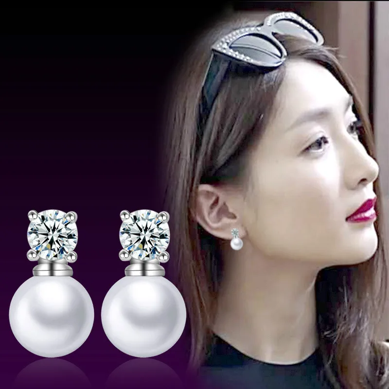 Серьги-гвоздики женские серебряного цвета с жемчугом и цирконом - купить по