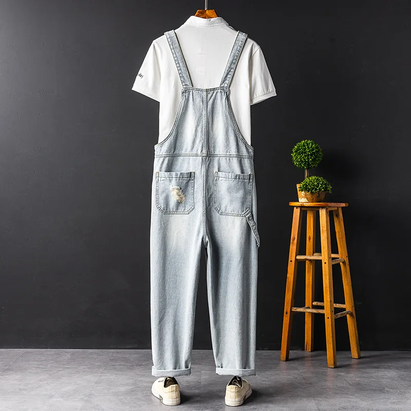 Men Hole Bib Denim Overalls Loose Fashion Hip Hop Ripped Jeans Jumpsuit Blue Tattered Homme Wide Leg  Pants Freight Trousers