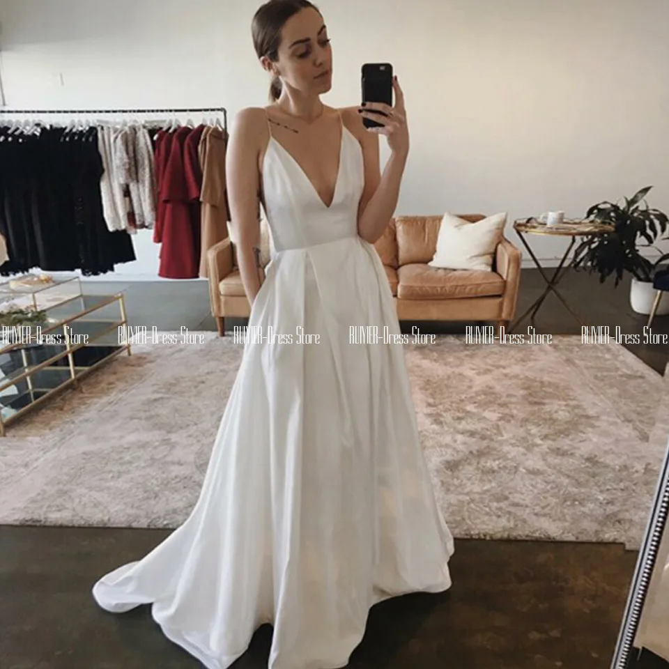 

Sexy V Neck White Wedding Dress Spaghetti Straps A-line Satin Bride Dress With Pockets Zipper Up Back Vestidos De Novia