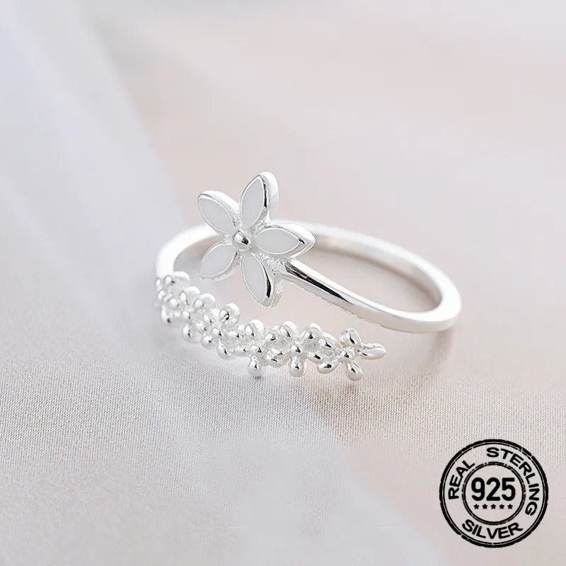 

Кольцо женское регулируемое из серебра 925 пробы с белыми цветами вишни