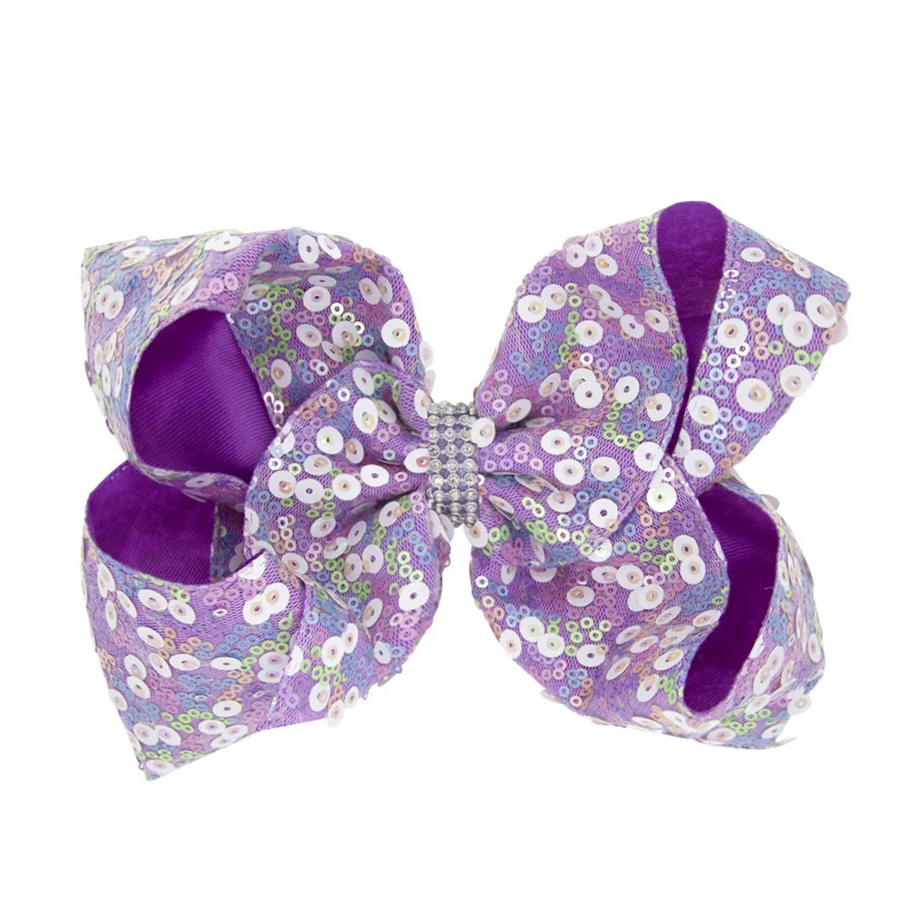 Прошитая блестящая юбка с блестками и бантами в горошек цветная Шпилька для