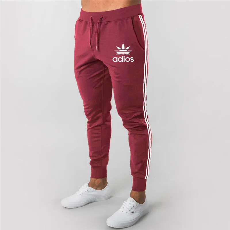 

2021 Spring new running sports pants European and American style slim stretch casual pants men's sports trend breathable pants