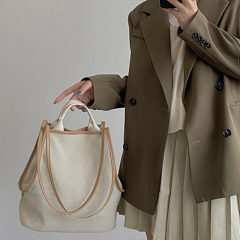 

2021 new casual woven portable bucket bag simple large-capacity cloth bag single shoulder female bag
