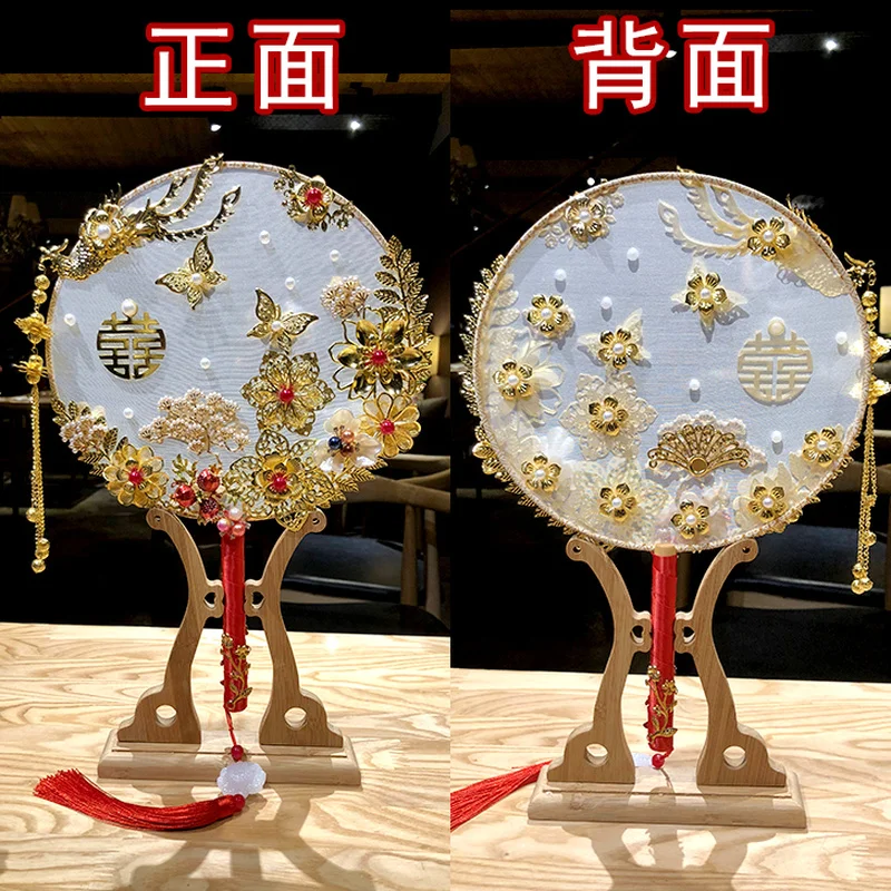 

Chinese bride group fan ancient wind out of the wedding hand holding flowers wedding fan wedding fan finished product pink fan