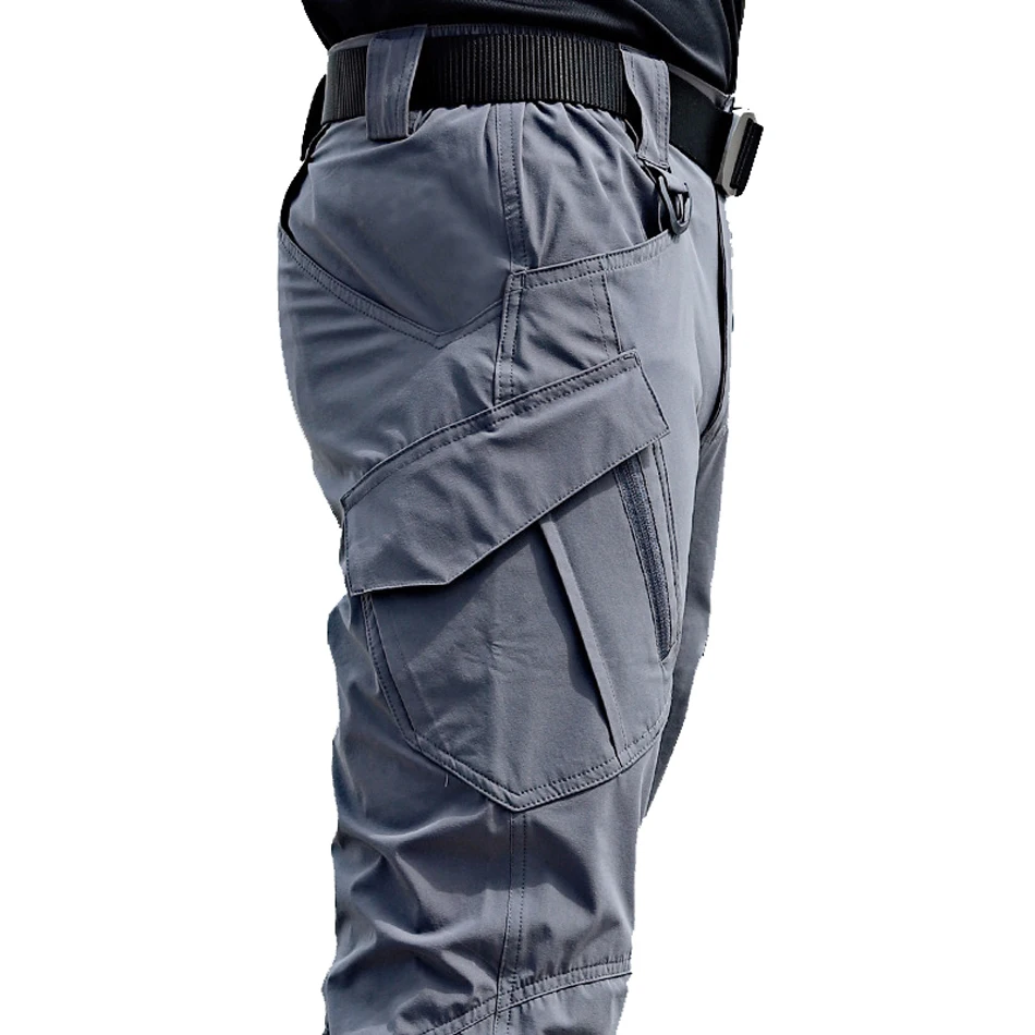 2021 New Mens Tactical Pants Multiple Pocket Elasticity Military Urban Commuter Tacitcal Trousers Men Slim Fat Cargo Pant 5XL