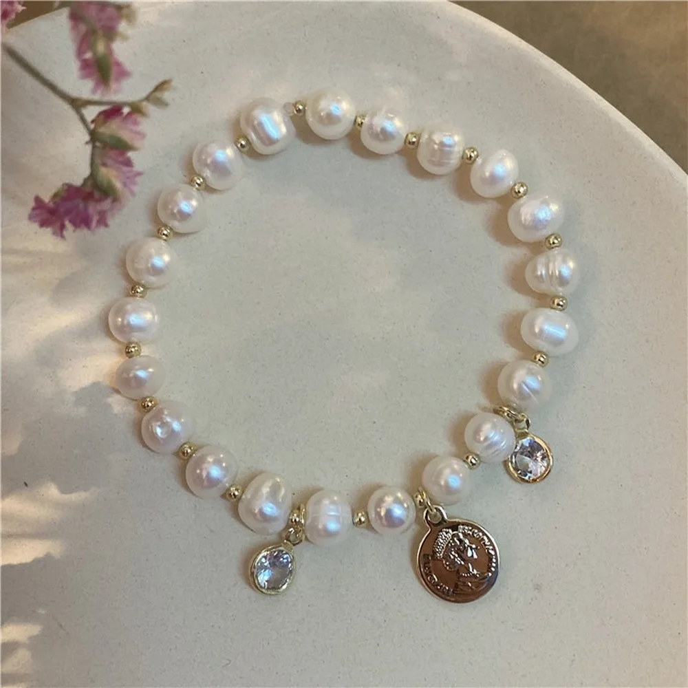 

Fashion temperament simple wild ins style freshwater pearl metal personality portrait bracelet elasticity adjustable simple