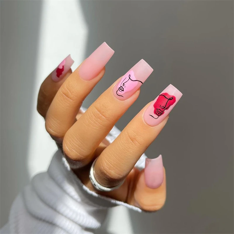 

JP1433 Press On Nude Nails Medium Length Coffin Shape with Abstract Face Design