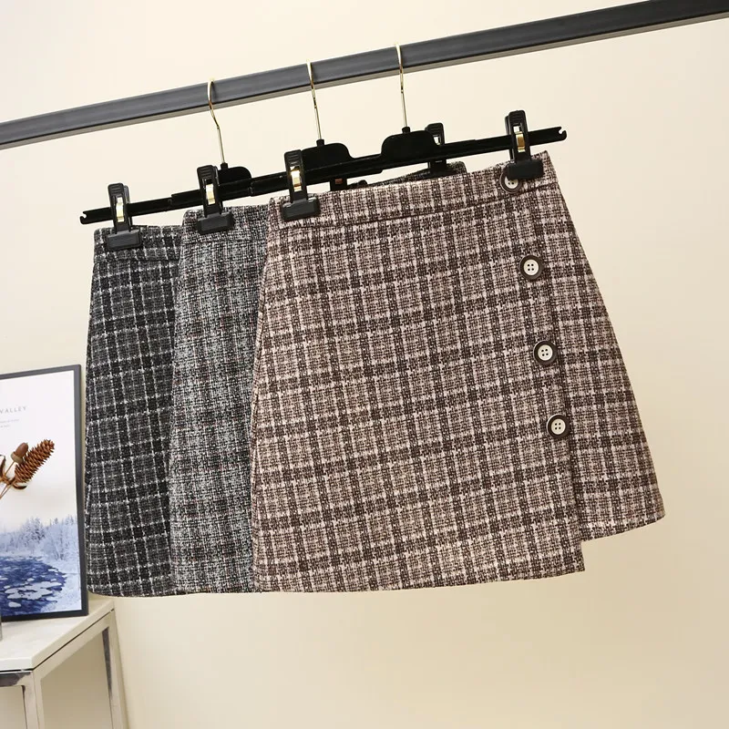 Шерстяная клетчатая юбка трапециевидной формы с пуговицами и асимметричным