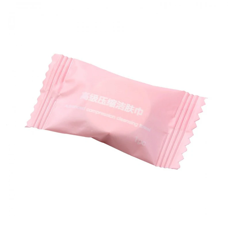 

50pcs/lot QDRR Compressed towel travel size disposable face towel pure cotton portable travel essential supplies candy pellets