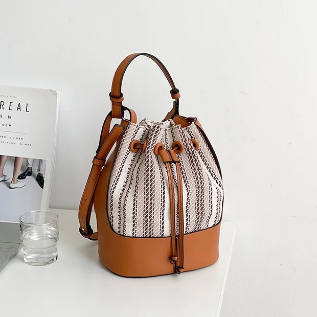 

Korean Stitching Stripes Bucket Bags for Women 2021 New Canvas Small Shoulder Bag Female Handbags Casual Tassel Crossbody Bag