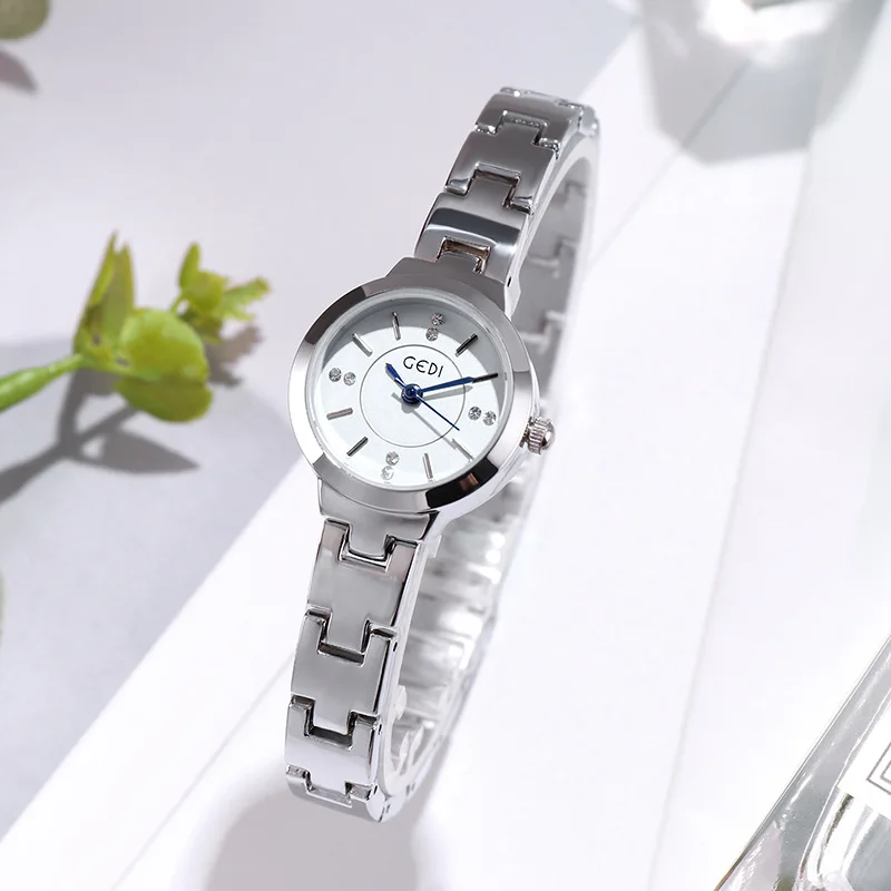 

GEDI high level appearance small temperament lady watch contracted students scale steel and women watch waterproof quartz watch