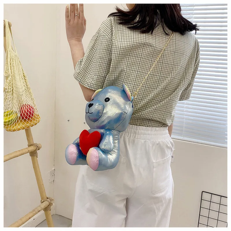 

Women Holographic Bag Toy Doll Laser Heart Bear Messenger Bag Girls Cute Phone Purse Crossbody Shoulder Bags For Girls