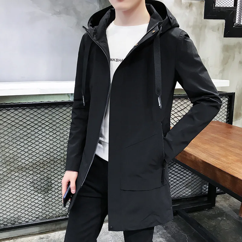 

Men's windbreaker long section Korean version of the trend of simple casual windbreaker Youth college wind solid color coat