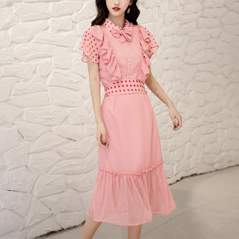 Возможно U розовое платье в горошек с бантом и оборками на рукавах коротким